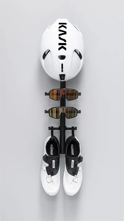 A collection of bike accessories, starting with helmet, sunglasses and biking shoes